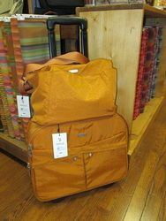 Baggallinni Gold Rolling Suitcase and Tote